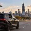 Black SUV traveling from Midway Airport toward downtown Chicago