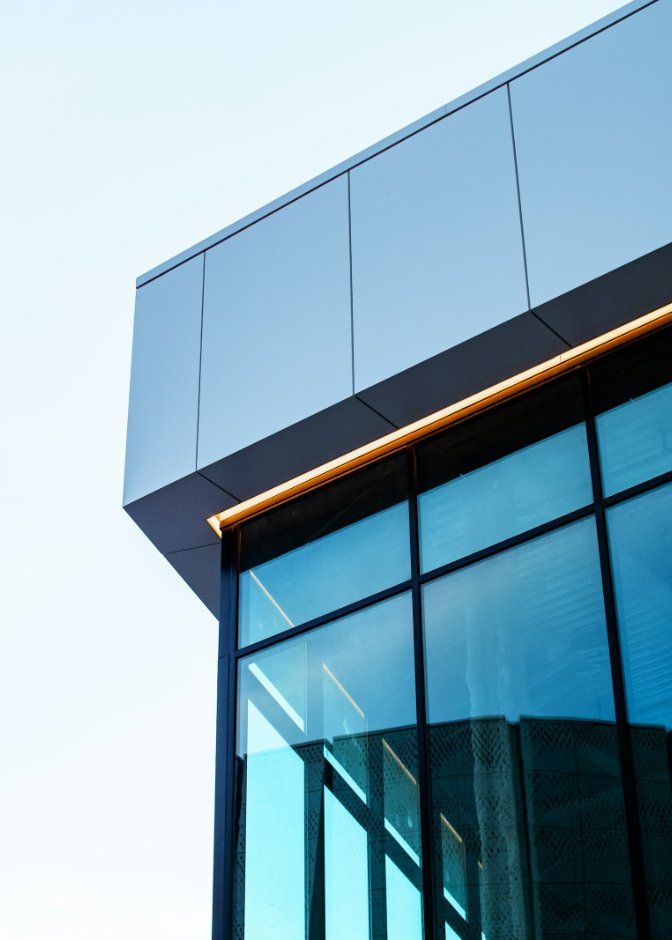 Modern glass office building exterior, representing Rosemont business district